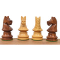 Four carved knights in golden rosewood and boxwood showing front, rear, and side profile craftsmanship.