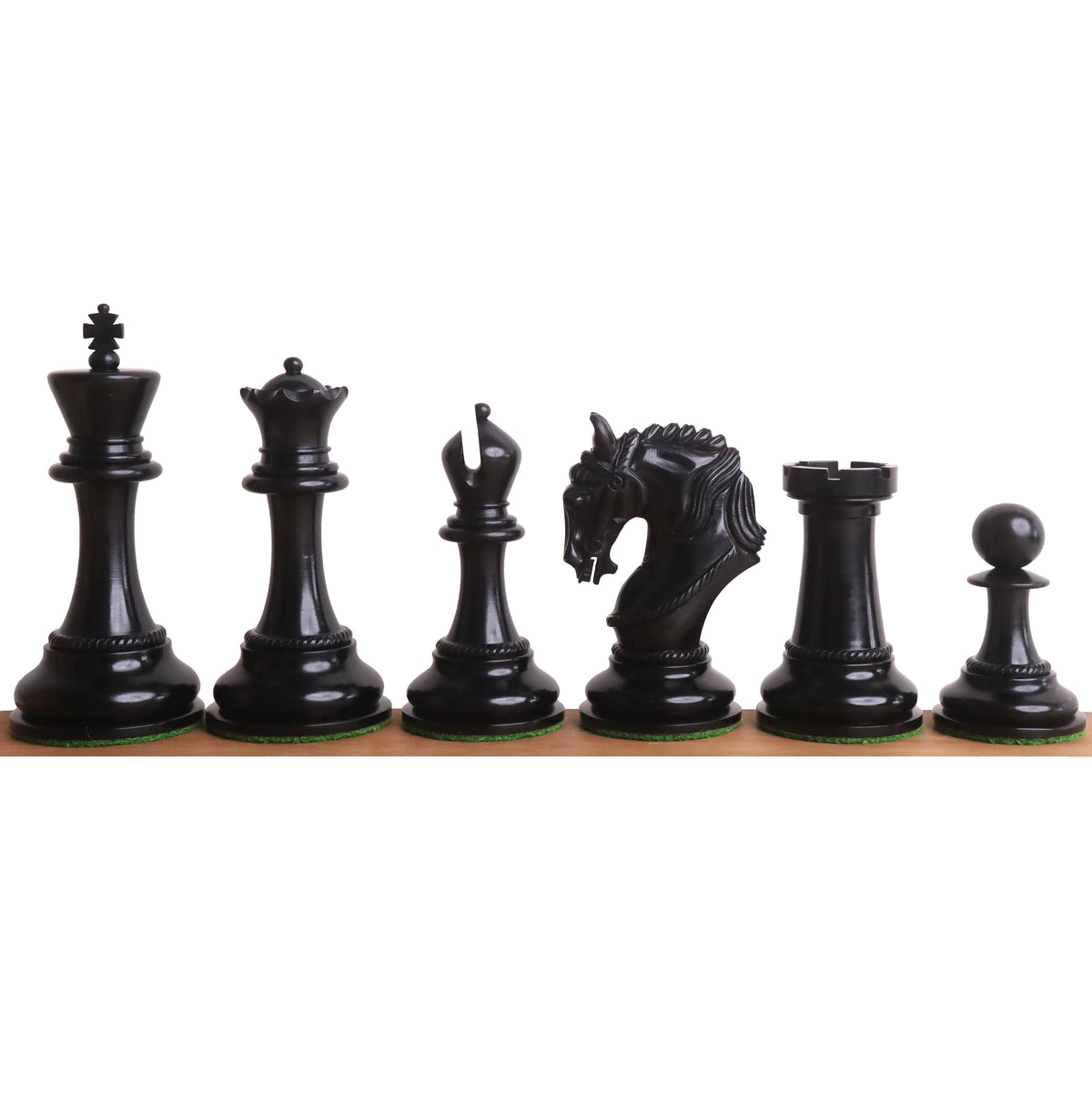 Polished ebony wood Imperator luxury Staunton chess pieces displayed in a straight line.