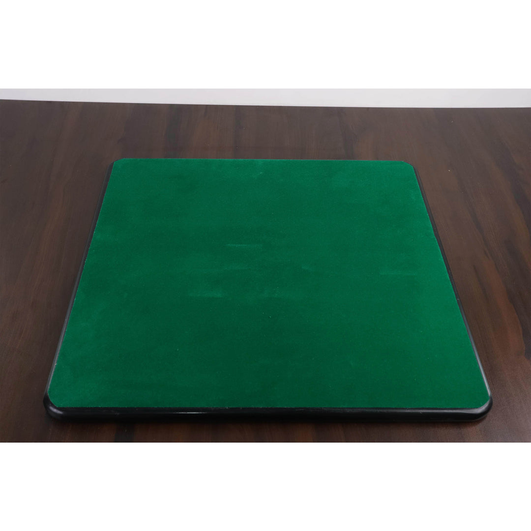 Underneath view of a chessboard featuring a green felt backing for surface protection.