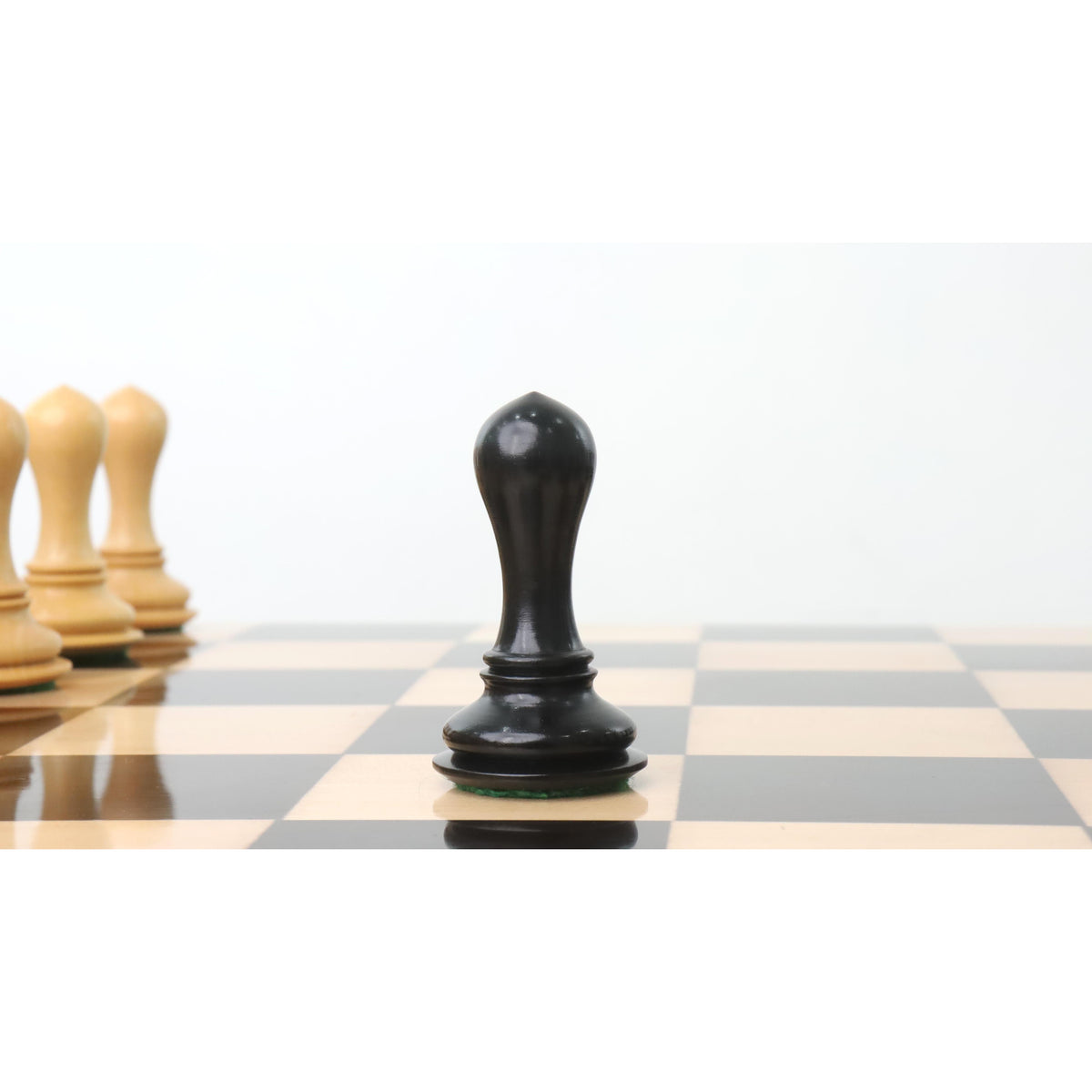 Single black ebony pawn from the Avant Garde luxury chess set.