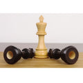 3 inch Craftsman Staunton King in boxwood standing over two fallen ebonised boxwood Queens.