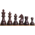 Complete set of six tournament style rosewood chess pieces arranged by height against a plain background.
