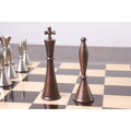 Detailed view of the antiqued copper King and Queen chess pieces.