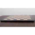 Low angle side view highlighting the sleek profile and solid wood construction of the 23 inch chess board.