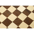 Macro shot of the seamless wood inlay on a 21-inch golden rosewood and maple chess board.