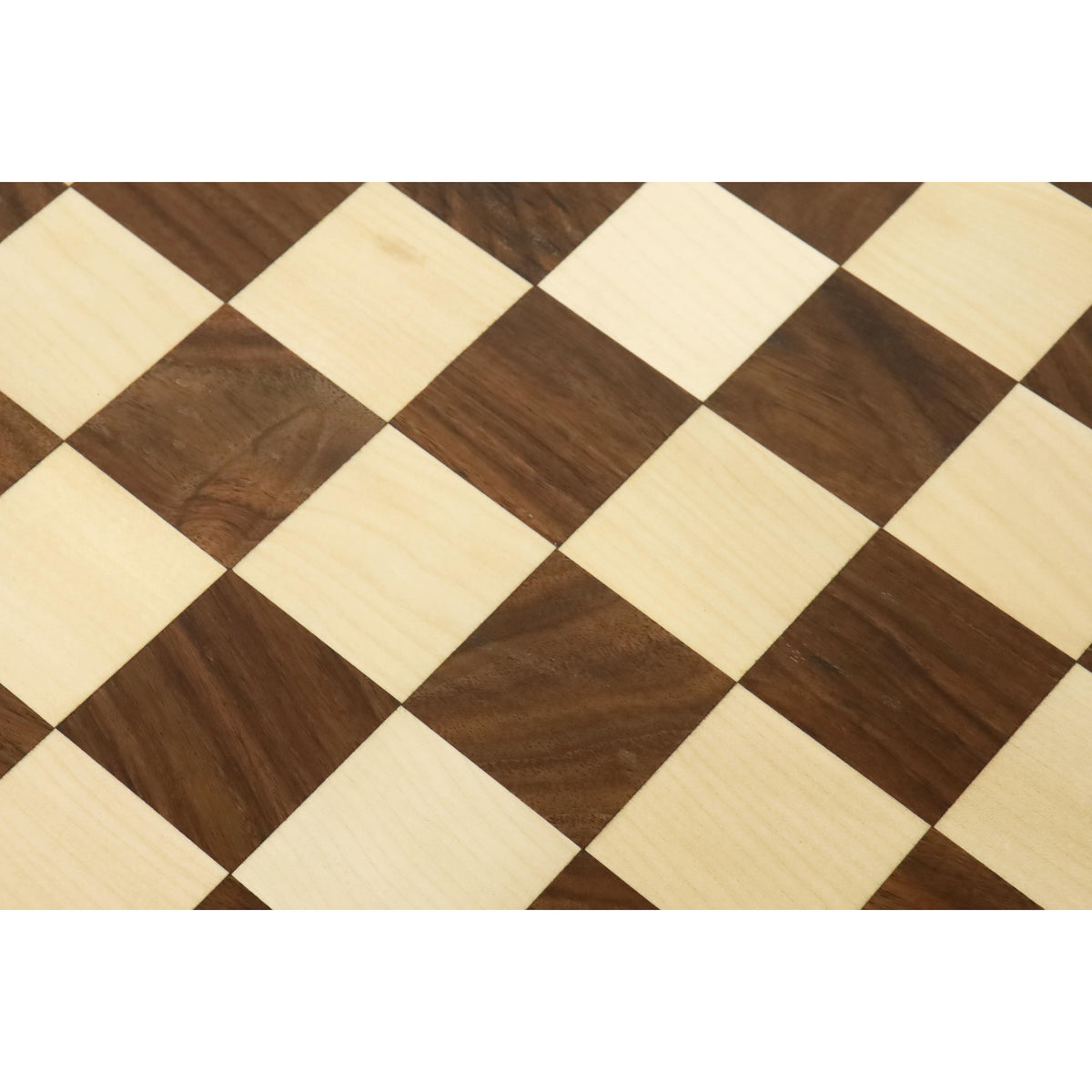 Macro shot of the seamless wood inlay on a 21-inch golden rosewood and maple chess board.