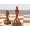 Golden Rosewood King and Queen Staunton pieces showcasing intricate carving and weighted stability.