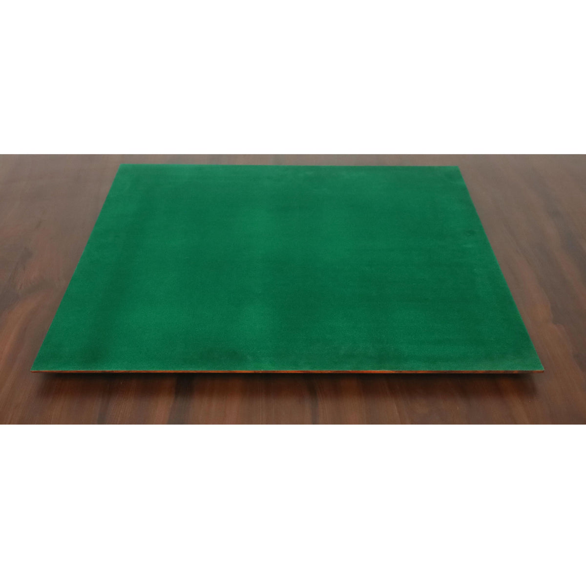 Protective green felt base on the underside of a large ebony and maple wood chess board.