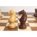 Side-by-side view of the hand-carved Soviet knight in light and dark woods.