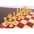 Elegant setup of light boxwood Marengo chess pieces on a wooden board.