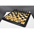 Full 1972 Reykjavik Championship chess set with boxwood and ebonized pieces arranged on a luxury chess board.