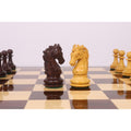 Side profile view of the finely detailed Rosewood and Boxwood Knights from the 3.9" Heritage Series Staunton chess set.