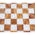 Close-up of the polished brown onyx and white marble stone squares on a 15-inch handcrafted board.