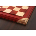 Detailed view of the corner joinery on a bud rosewood and maple luxury chessboard.