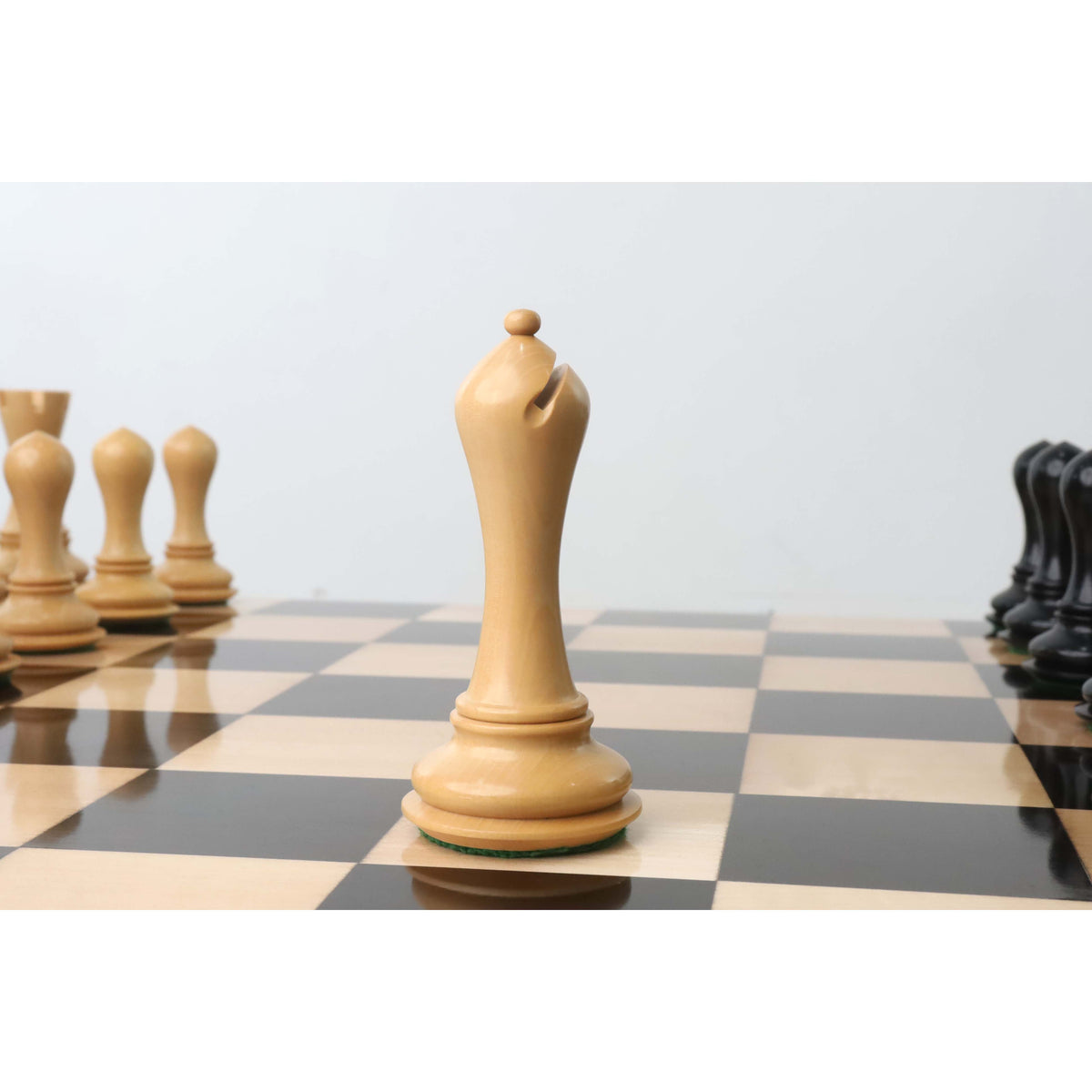 Detailed ivory boxwood bishop from the Avant Garde luxury chess set.