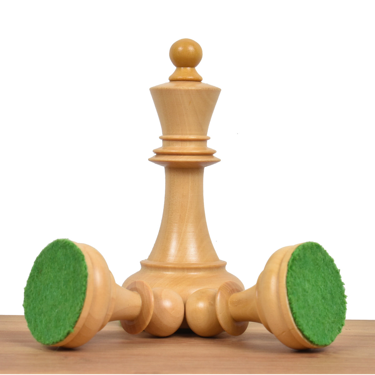 Weighted base and green felt pad of Dubrovnik chess pieces.