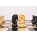 Black ebony and light boxwood Heritage Series Staunton knights positioned on a chess board.