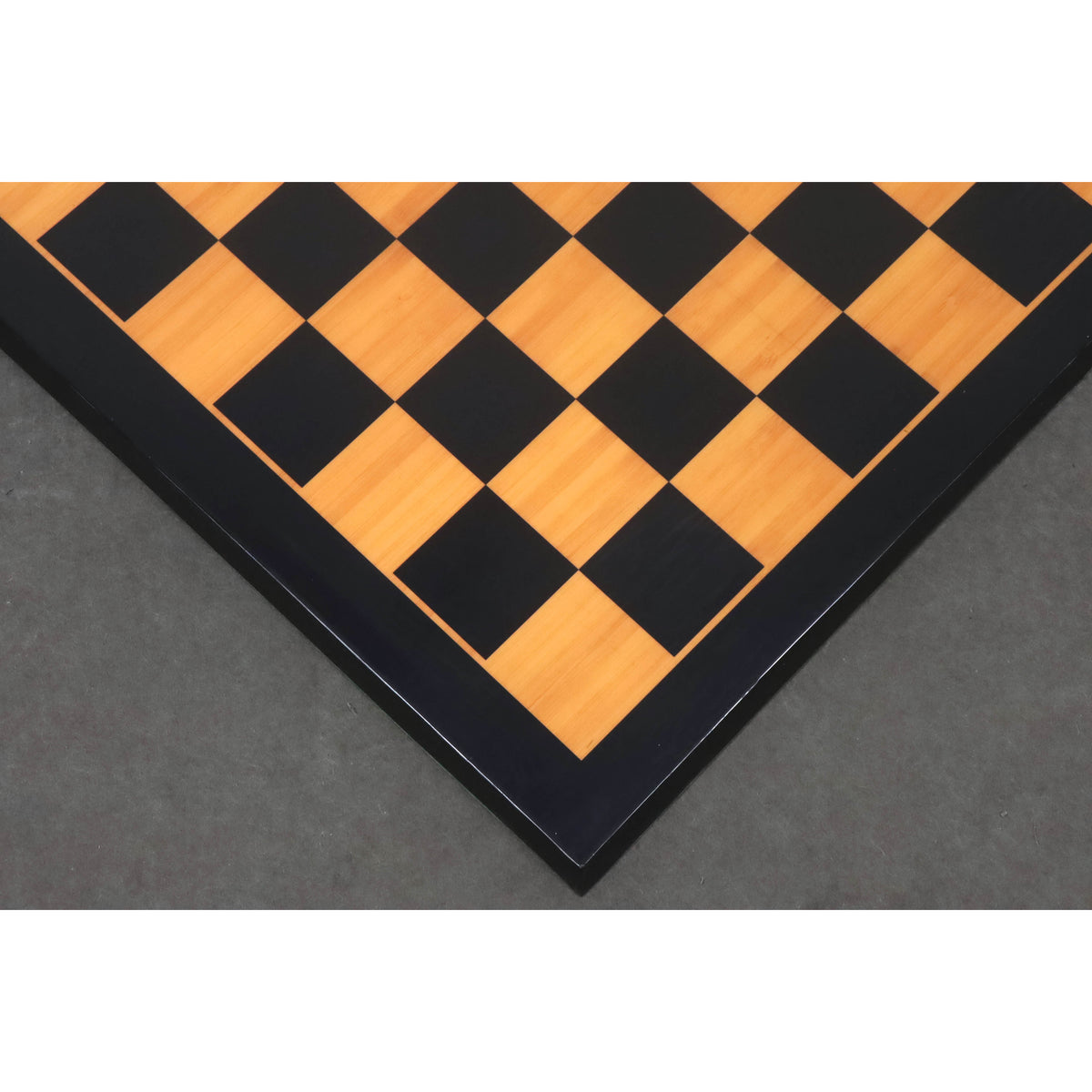 Angled overhead view of the 21 inch wooden printed chess board highlighting the wood grain texture and matt finish.