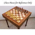 Luxury 23 inch rosewood chess table setup with a full set of Staunton wood chess pieces for a game.