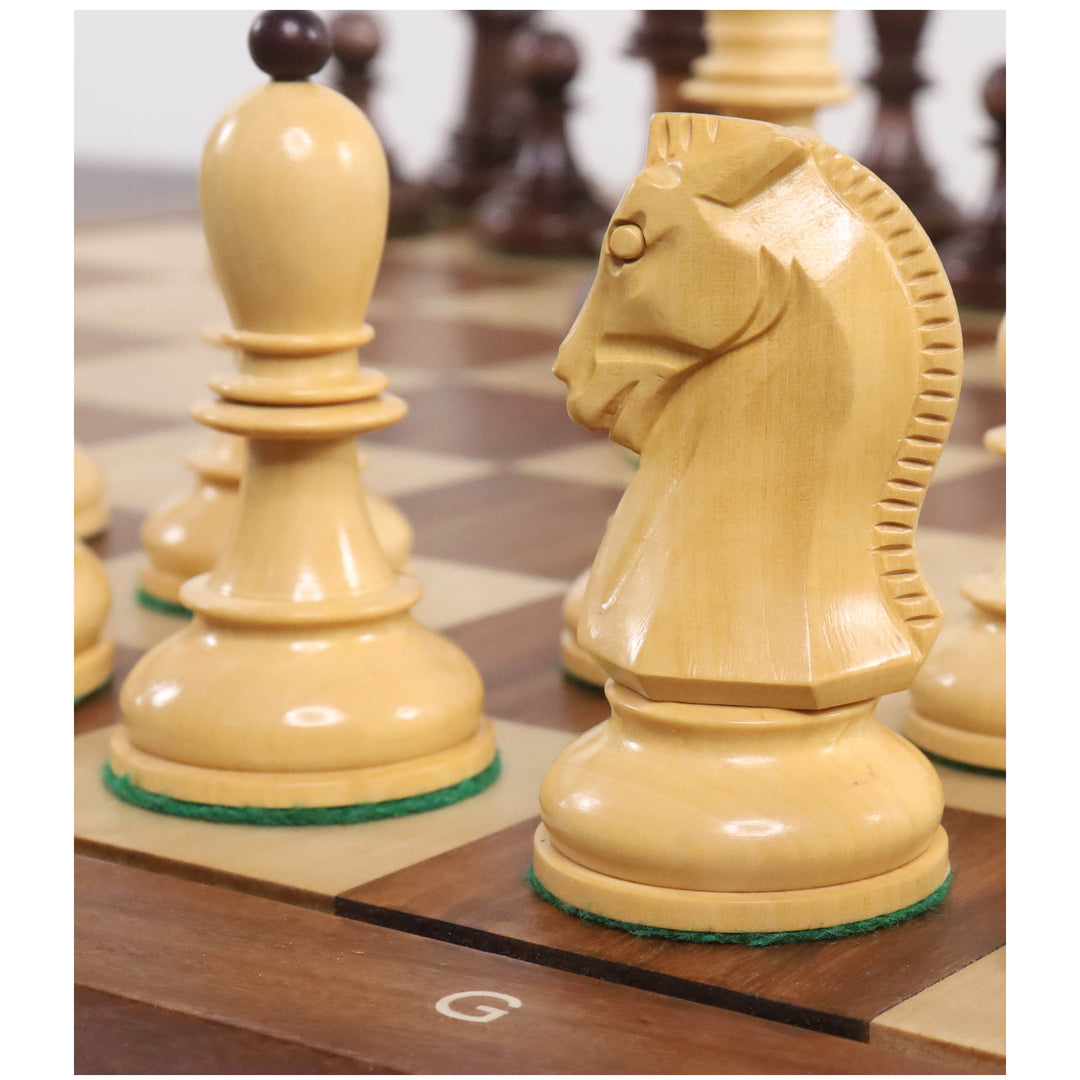 Macro view of a natural boxwood Fischer Dubrovnik knight and bishop on a board.