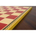Detailed view of the intricate yellow patterned border on a Leuchars wooden printed chess board.