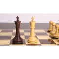 Dark rosewood and light boxwood kings from the 3.5" Monolith miniature chess set standing together.