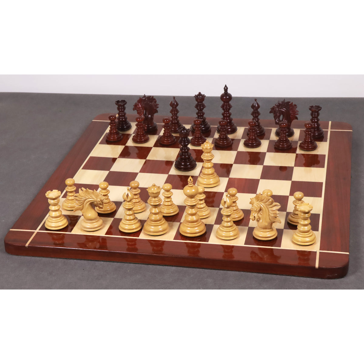 Complete 4.3 inch Marengo luxury Staunton chess set displayed on a wooden board.