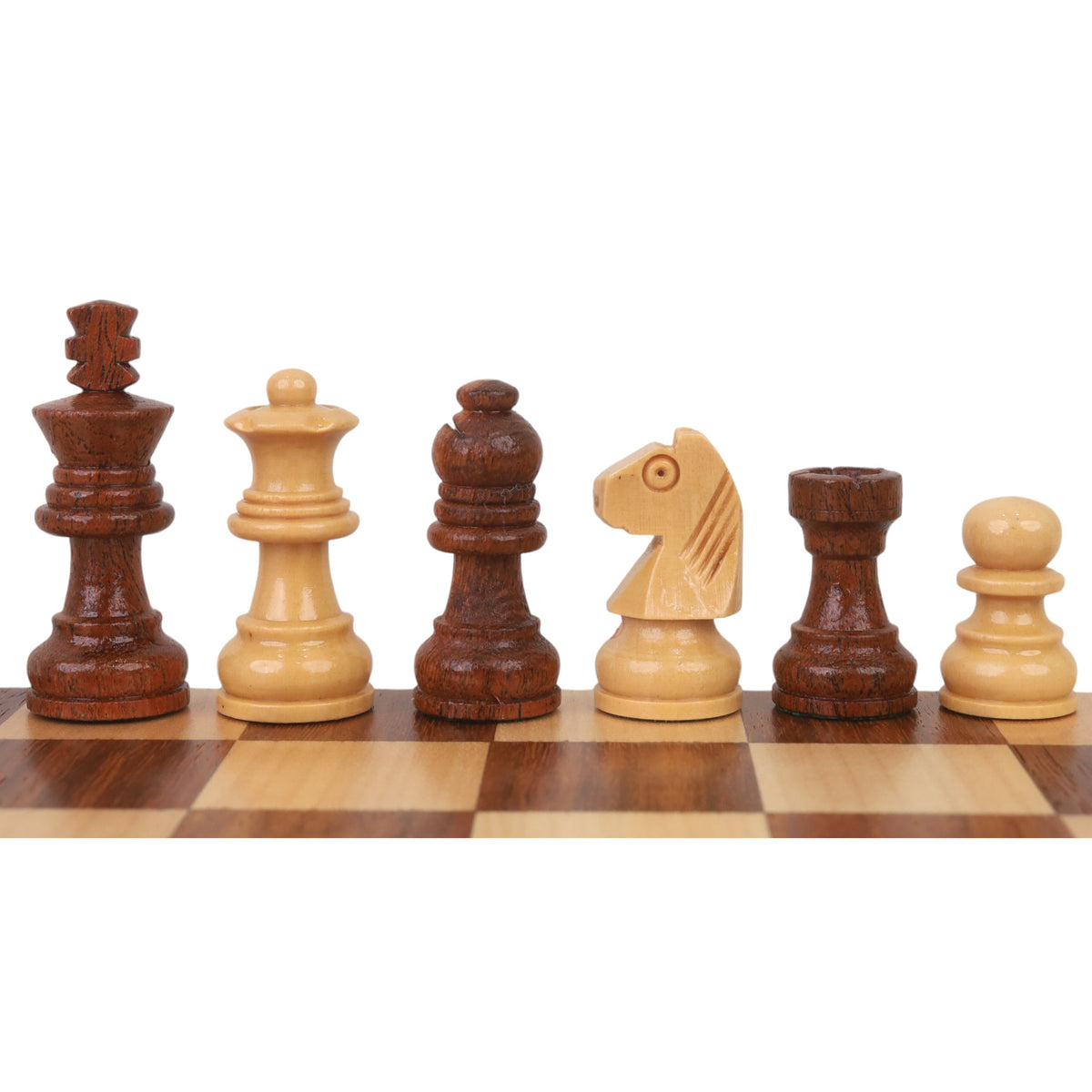 Close-up of magnetic golden rosewood and boxwood chess pieces showing fine handcrafted detail.