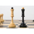 Hand-carved Averbakh Soviet queen pieces in ebonised boxwood and natural boxwood.