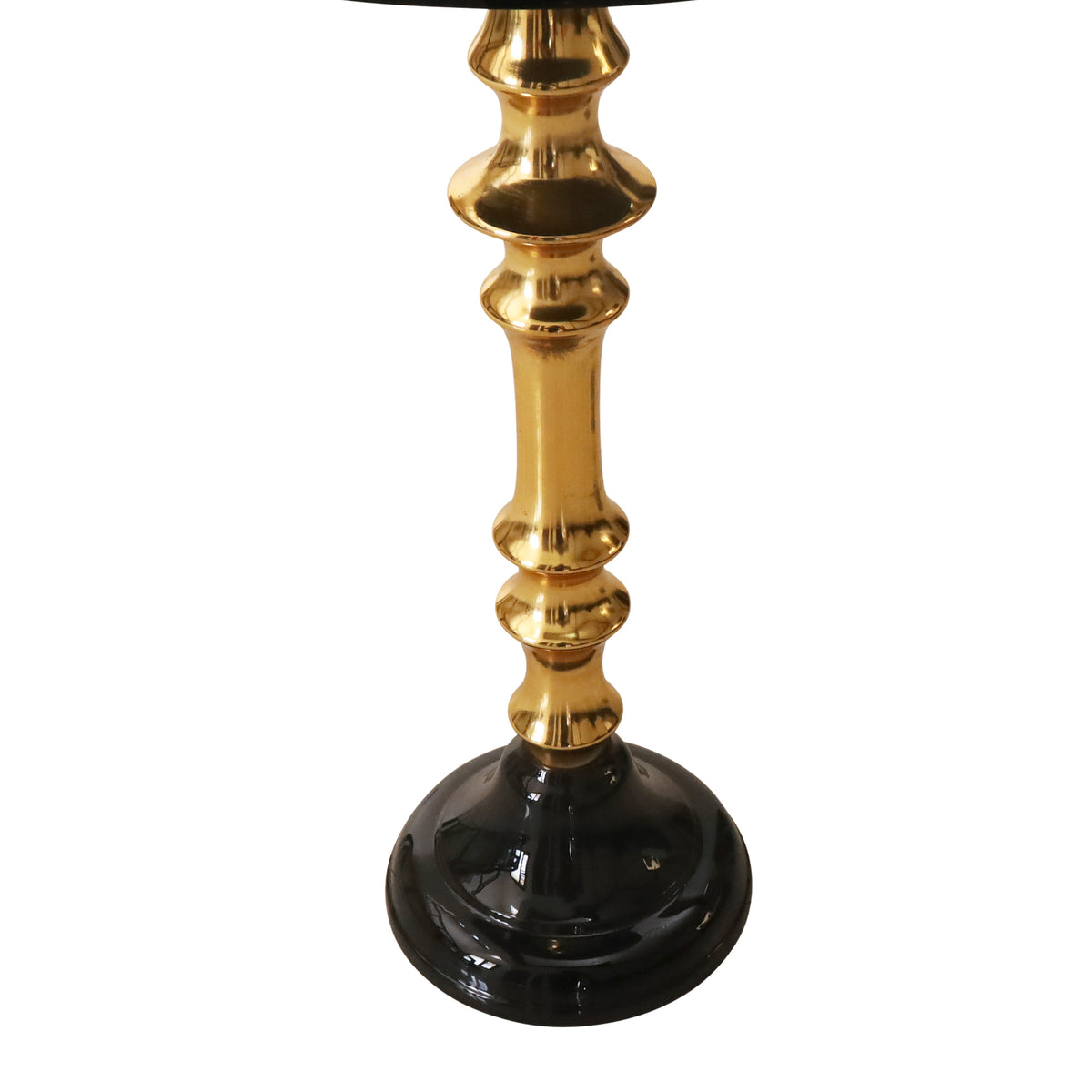 Ornate golden spindle pillar and polished black base of the 27-inch executive chess table.