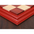 Close-up of the seamless corner joinery and polished finish of a Bud Rosewood luxury chessboard.