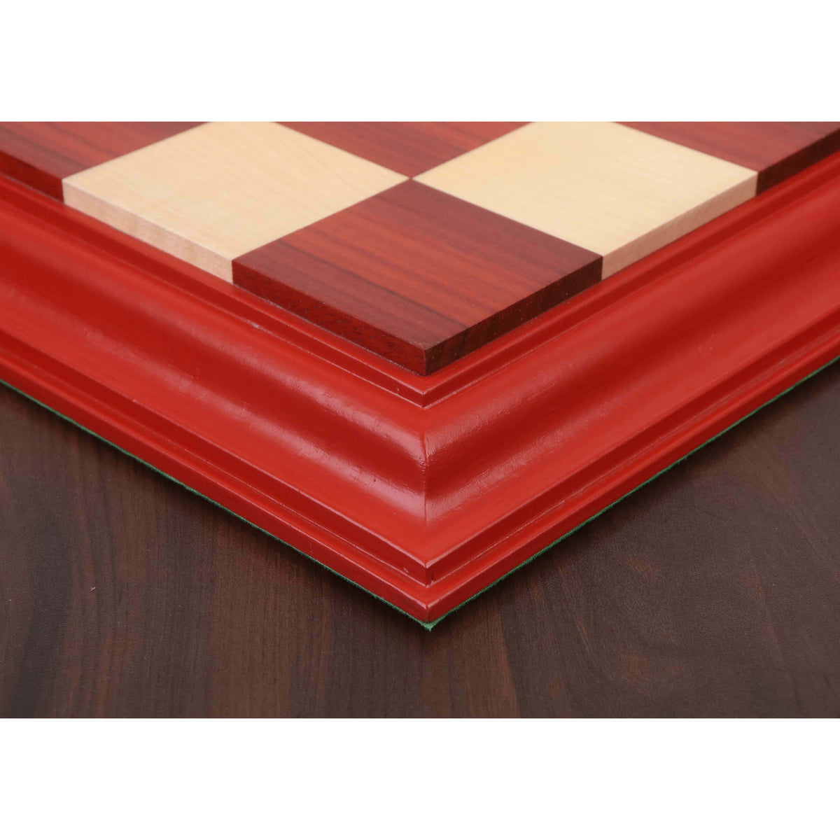 Close-up of the seamless corner joinery and polished finish of a Bud Rosewood luxury chessboard.