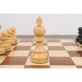 Detailed view of the light boxwood King from the 3.3 inch Taj Mahal chess set on a chessboard.