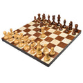 Full setup of the 3.8 inch Romanian Hungarian chess pieces on a wooden chess board, angled perspective.