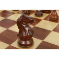 Detailed grain on a golden rosewood knight from the Fierce Knight Staunton pieces set.