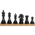 Complete lineup of ebonised boxwood Craftsman Staunton chess pieces with a polished black finish.