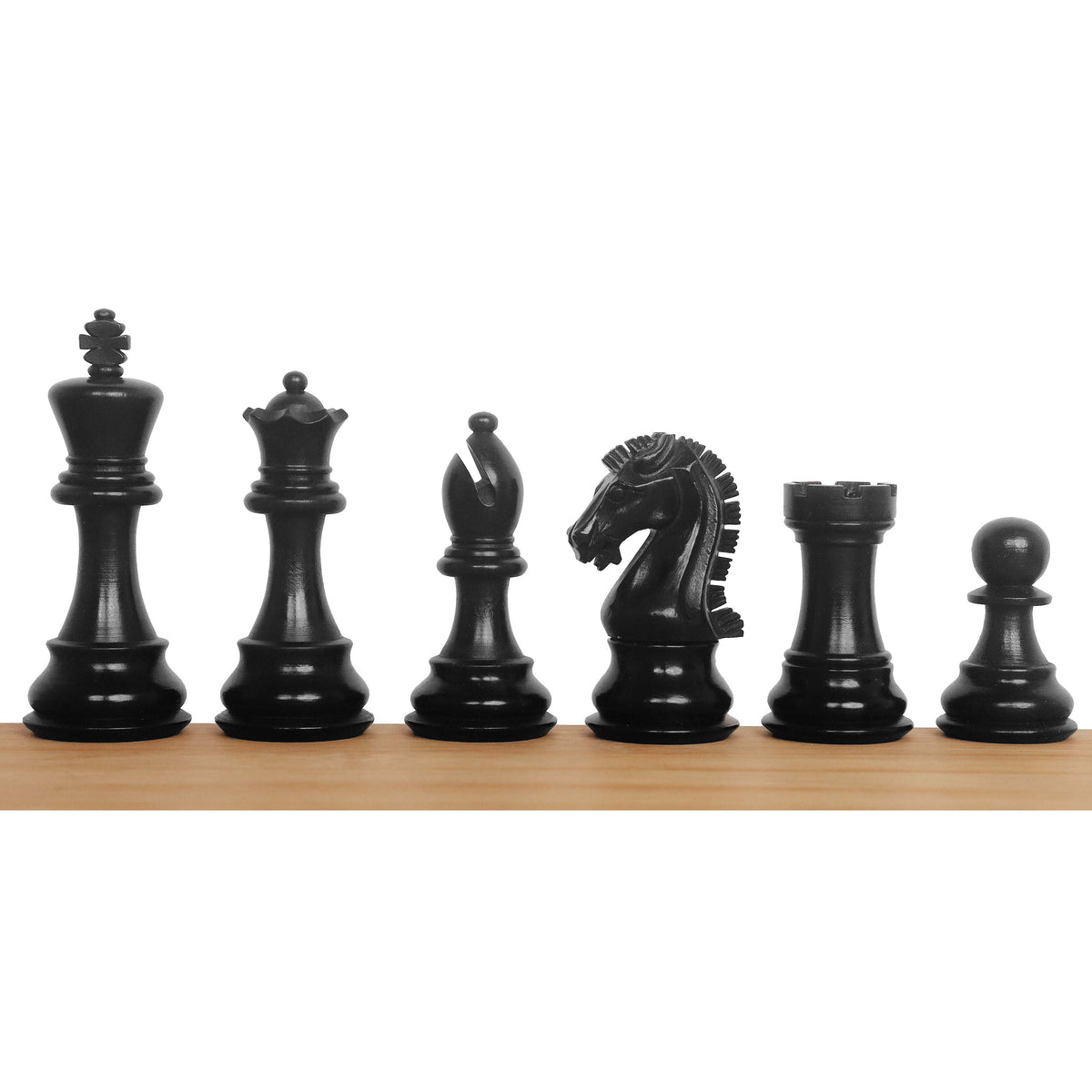 Complete lineup of ebonised boxwood Craftsman Staunton chess pieces with a polished black finish.