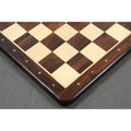 Top-down corner detail of the Rosewood chess board showing precise joinery and algebraic coordinates.