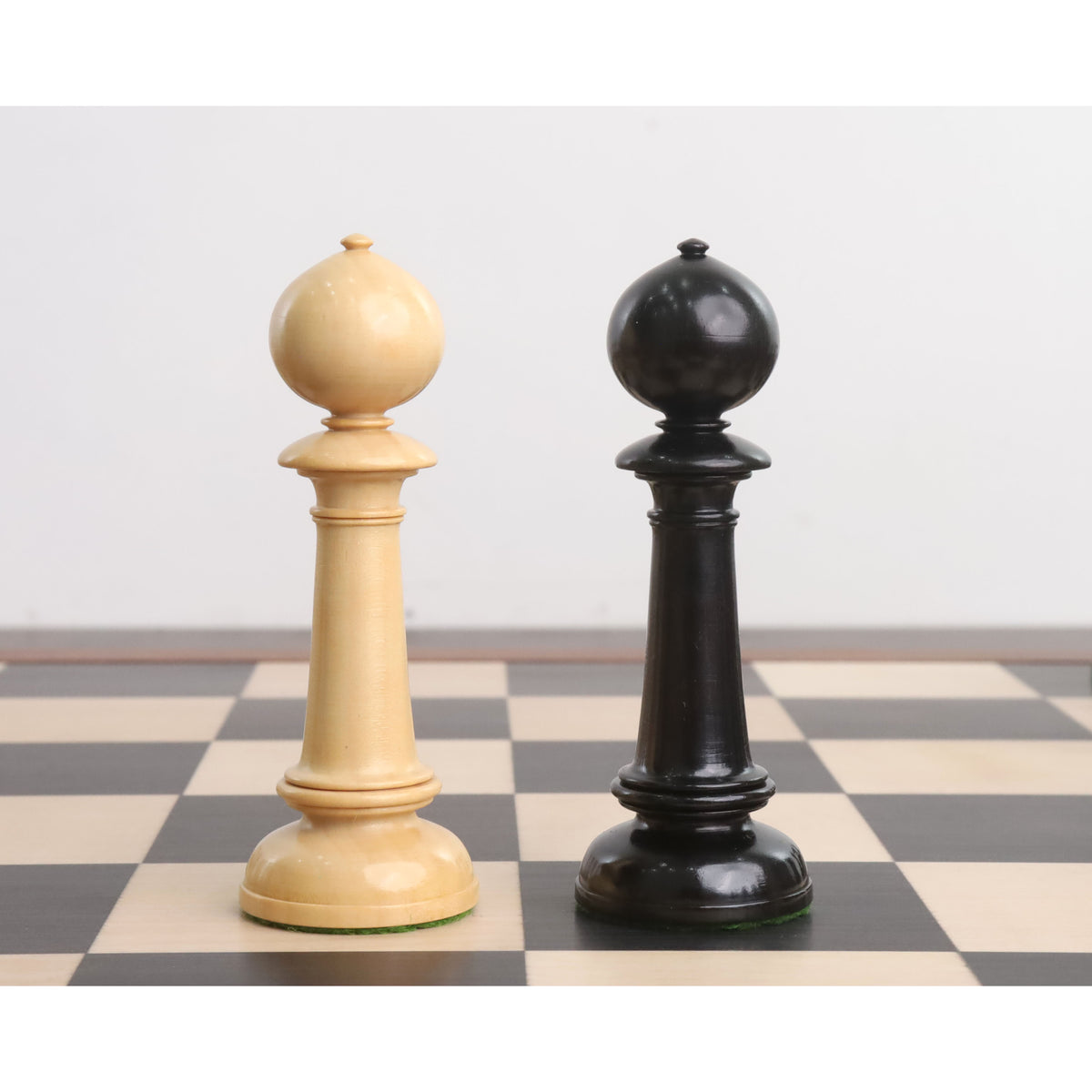 Boxwood and ebony king pieces from the Edinburgh northern upright pre-Staunton collection.