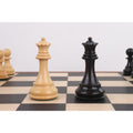 Light and dark queens from the 4" Fierce Knight Staunton chess set facing each other on a chessboard.