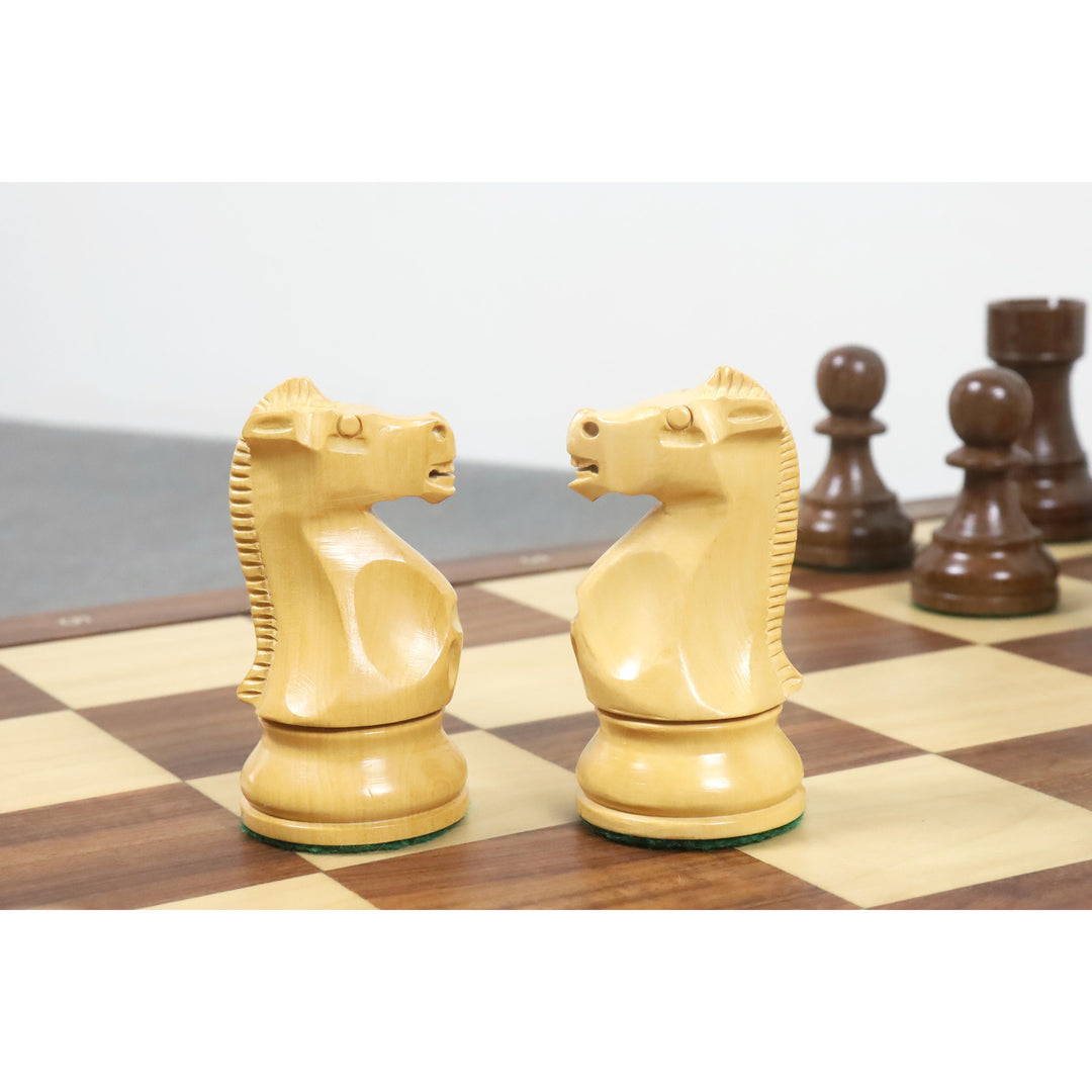 Detailed view of two hand-carved Boxwood Knights featuring the iconic 1972 Fischer Spassky profile.
