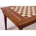 Extreme close-up showing the detailed wood grain and inlay of the Golden Rosewood and Maple chessboard.