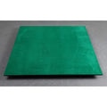Underside of a luxury wooden chessboard featuring a full green felt base for surface protection.