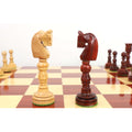Two 4.7" Lotus Series knights in Bud Rosewood and Boxwood facing each other on the board.