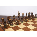Professional black Staunton chess pieces showcasing intricate hand-carved textures.