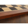 Close-up of the rich grain patterns in the Golden Rosewood (Sheesham) border of the 21 inch wooden chessboard.
