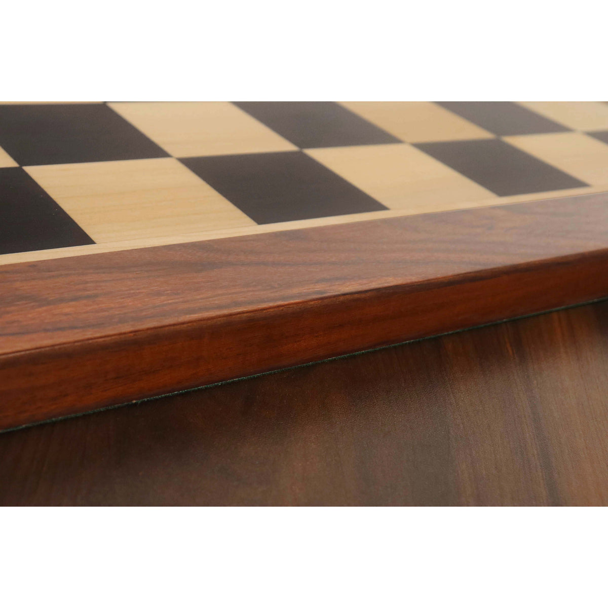 Close-up of the rich grain patterns in the Golden Rosewood (Sheesham) border of the 21 inch wooden chessboard.