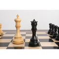 Goliath Series luxury Staunton boxwood king and ebony queen pieces on a board.