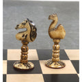 Carved camel and horse knight chess pieces in distressed antiqued finish showcasing realistic animal shapes.