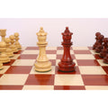 Elegant 4.5-inch Carvers' Art luxury chess queens in budrose and boxwood.